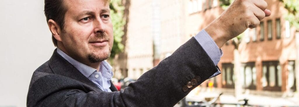 director of founder institute stockholm waves his hand in the air